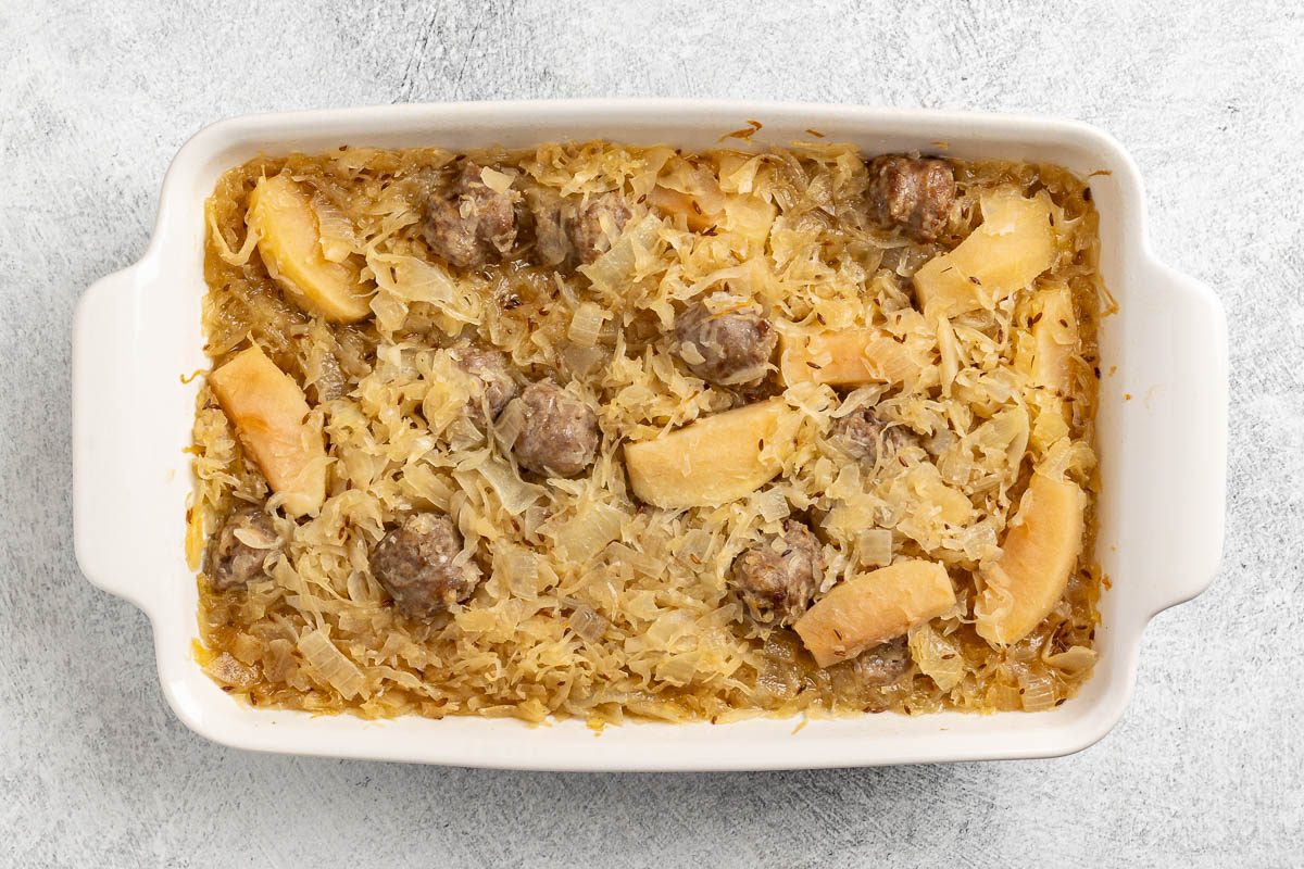 Taste of Home Sauerkraut Casserole recipe photo of the baked casserole in a baking dish.