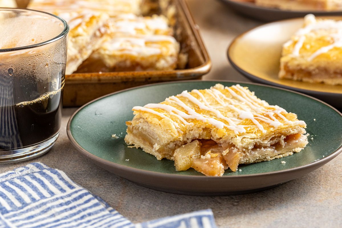 Taste of Home Apple Danish recipe photo of finished recipe cut into sqauares and served on plates.