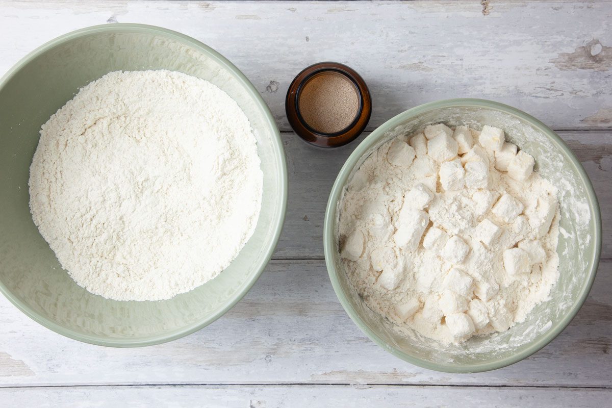 Step 1 of Taste of Home Bear Claw is to toss the butter with three cups of flour until well-coated; refrigerate. In a large bowl, combine the yeast and remaining two cups of flour.
