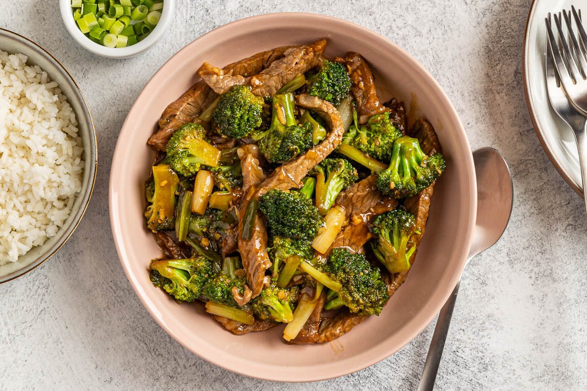 Taste of Home Beef with Broccoli Recipe photo of the finished recipe with a side of rice.