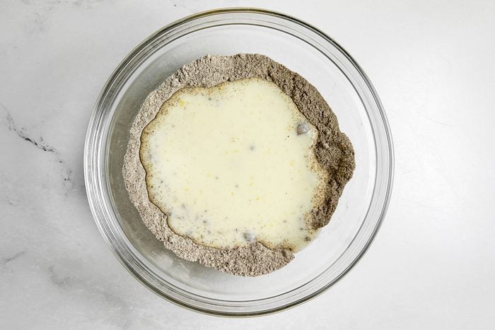 Batter for Taste of Home Buckwheat Pancakes in a glass bowl