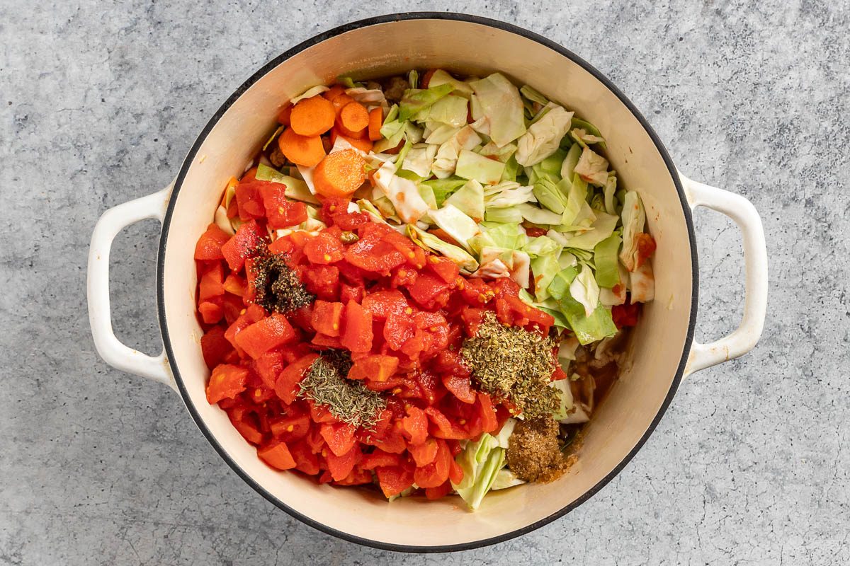 Taste of Home Cabbage Stew recipe photo of the remaining ingredients added to the Dutch oven.
