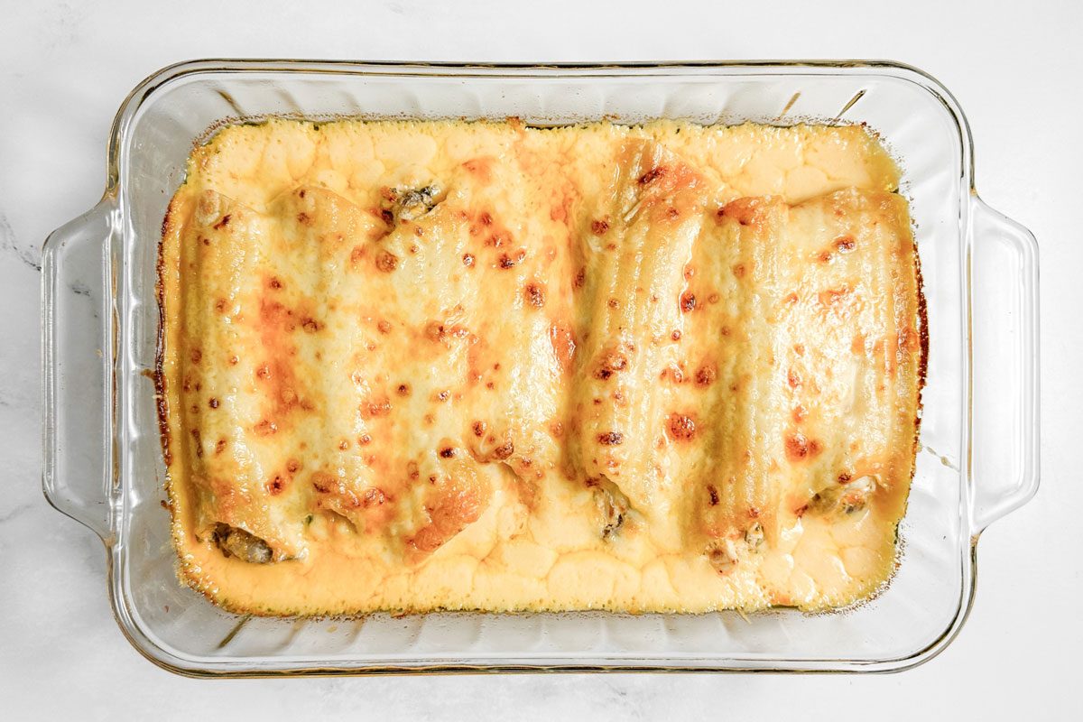 Taste of Home Chicken Manicotti in a glass baking dish