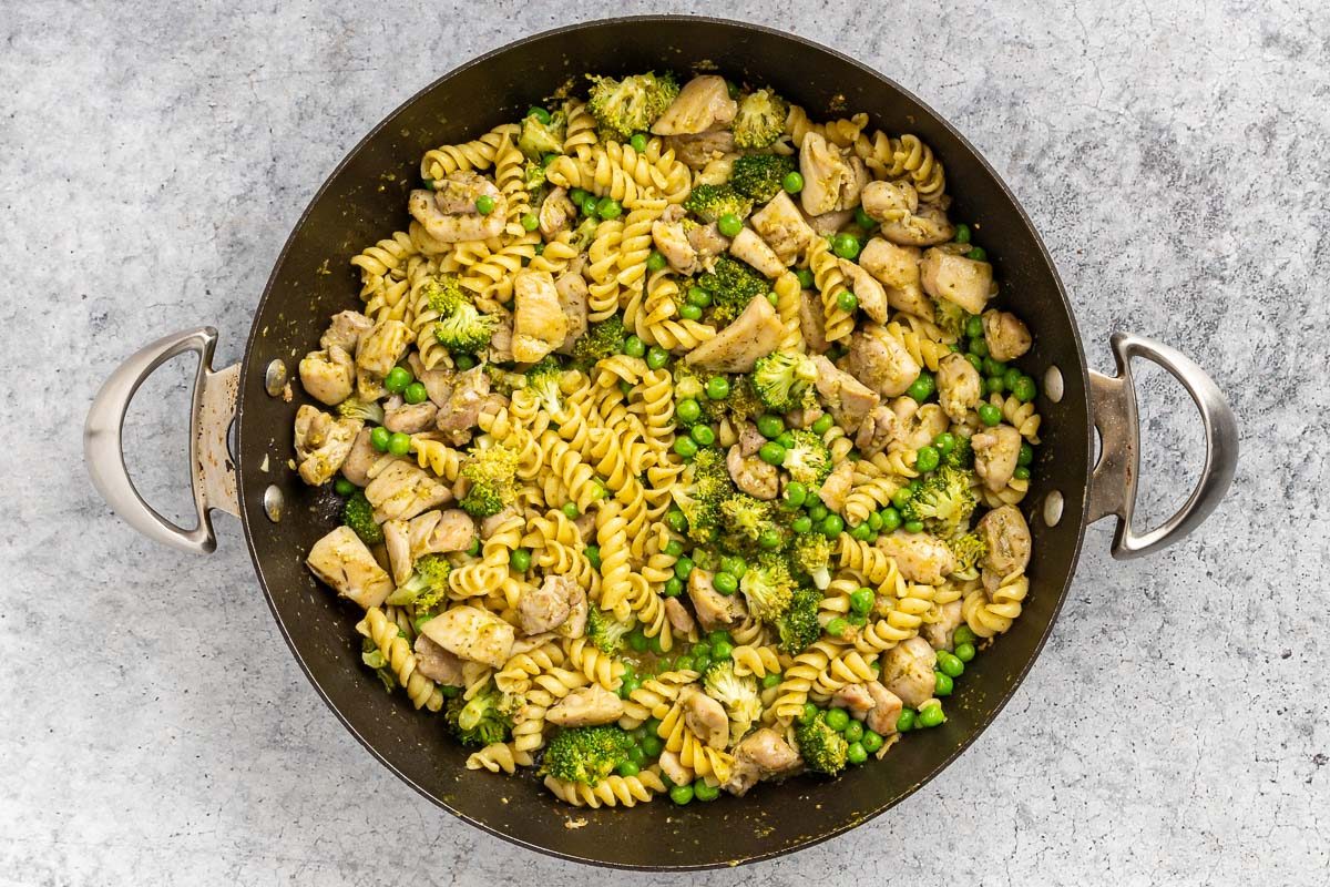 Taste of Home Chicken Pesto Pasta recipe photo of the rest of the ingredients added to the skillet and cooked to serve.
