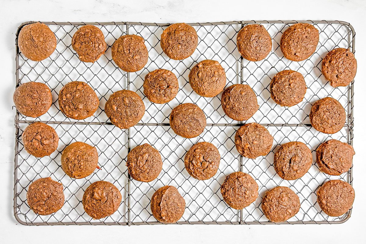 Taste of Home Chocolate Drop Cookies on a wire rack on a marble surface