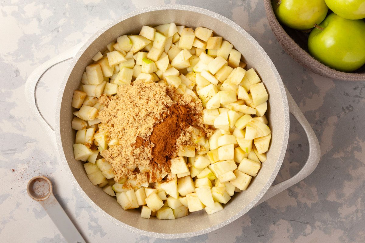 Step 1 of Taste of Home Chunky Applesauce is to add the chopped apples, brown sugar and cinnamon and a pot and cook over mmedium heat for 40 minutes or until soft
