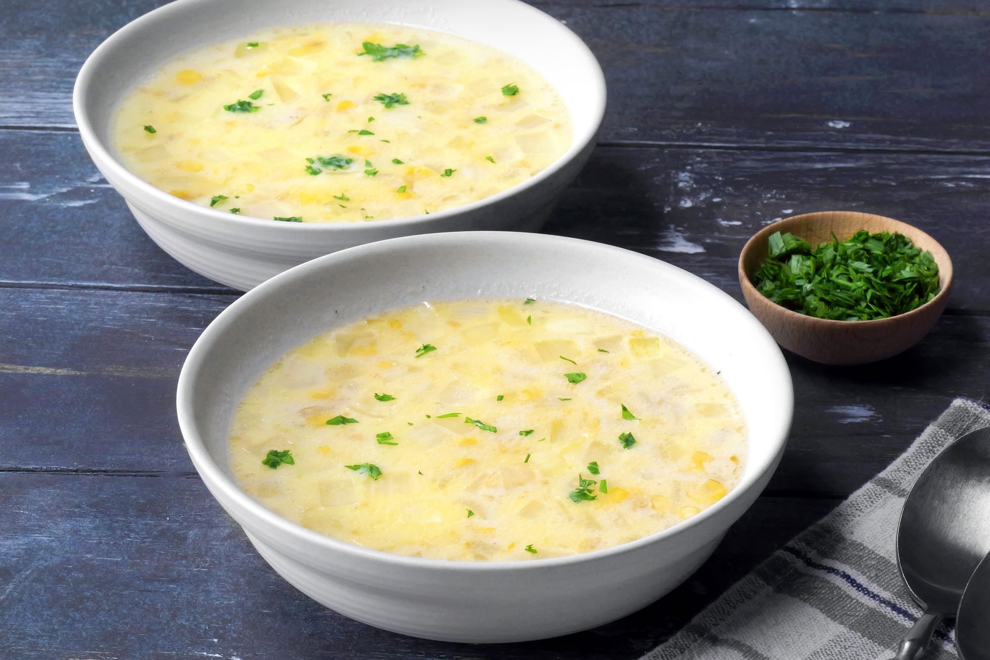 3/4th shot of corn chowder in bowls