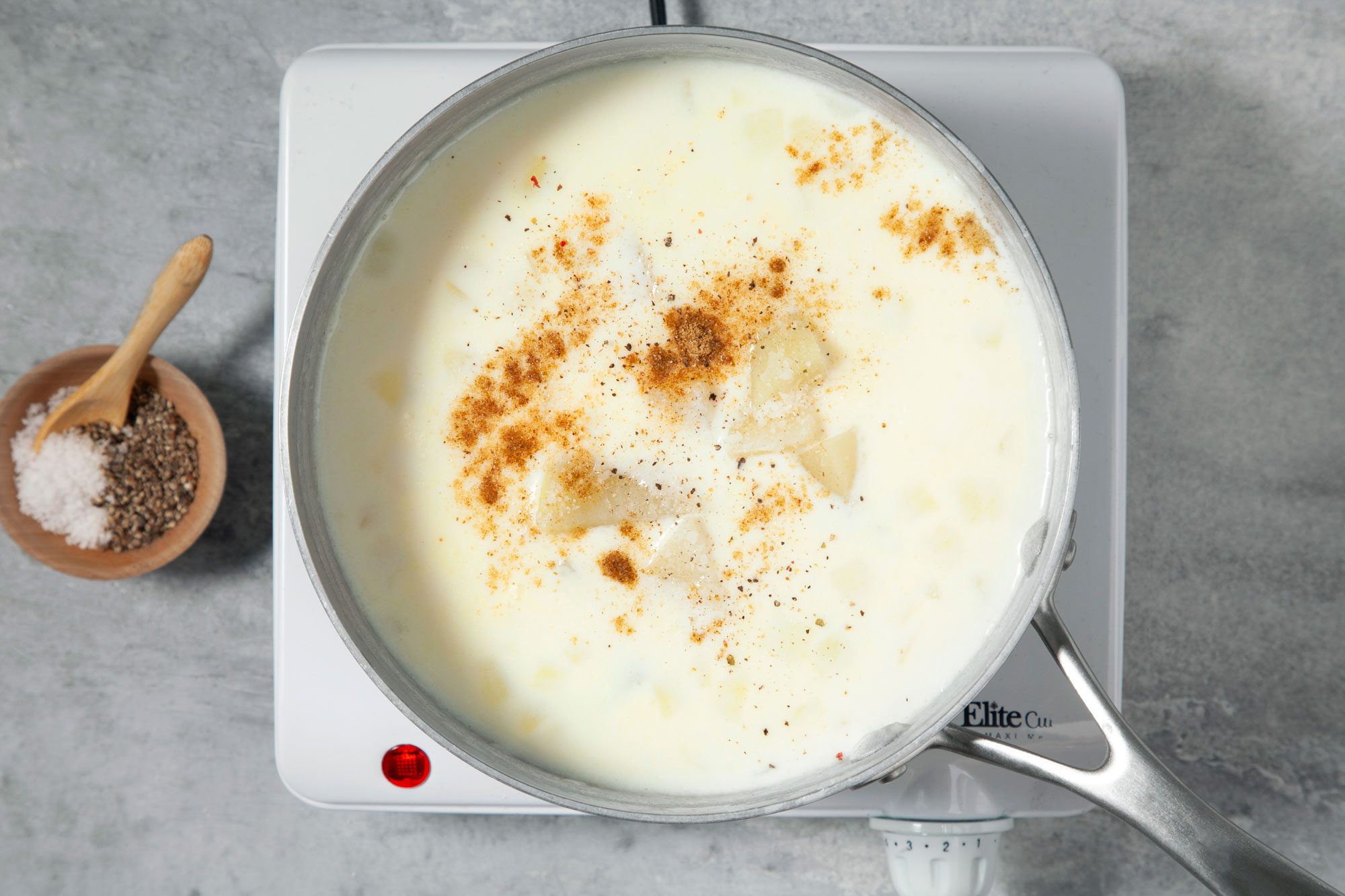 A small amount of spices has been sprinkled on top of the sauce, including salt and black pepper