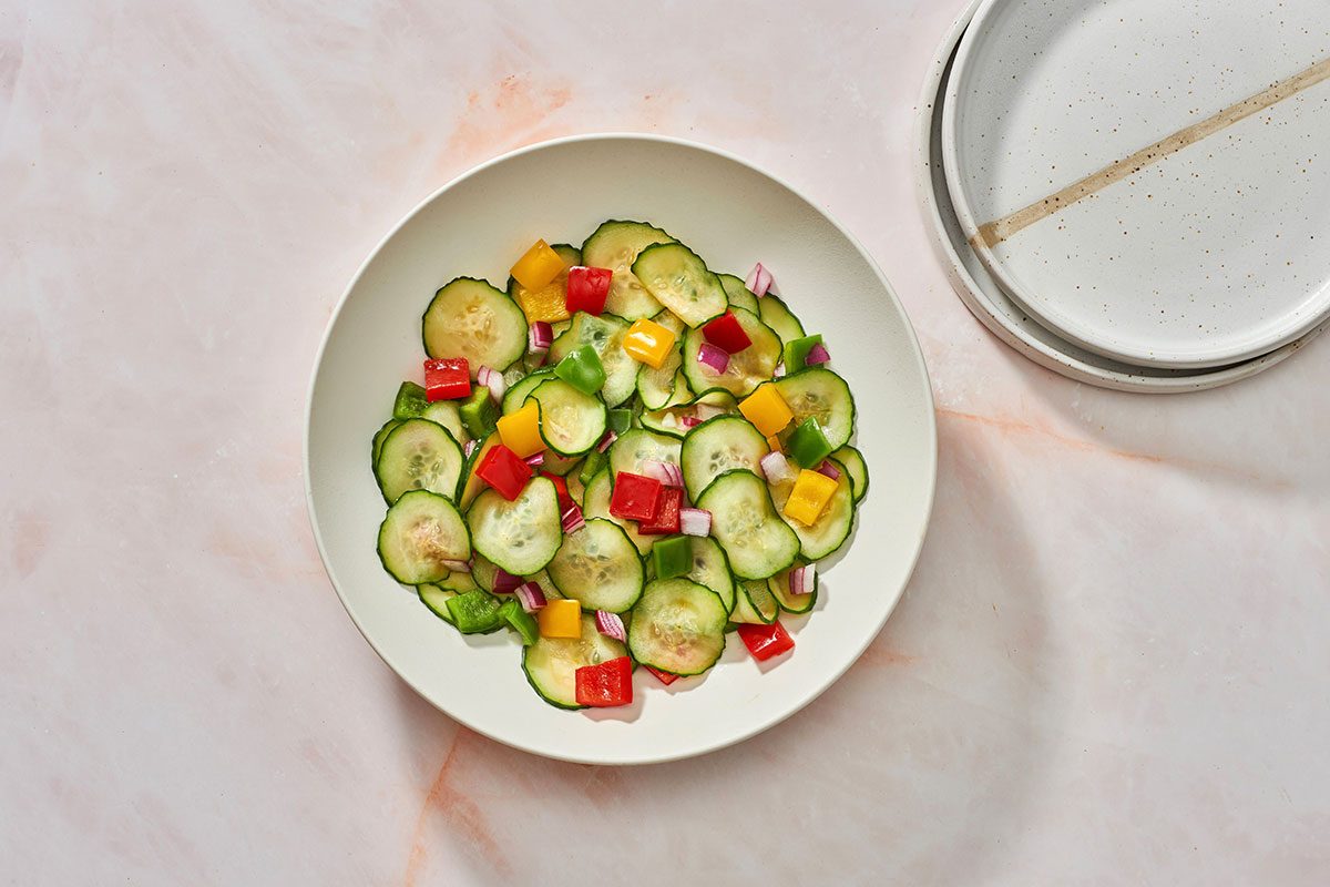 Cucumber Salad with Peppers in a serving bowl