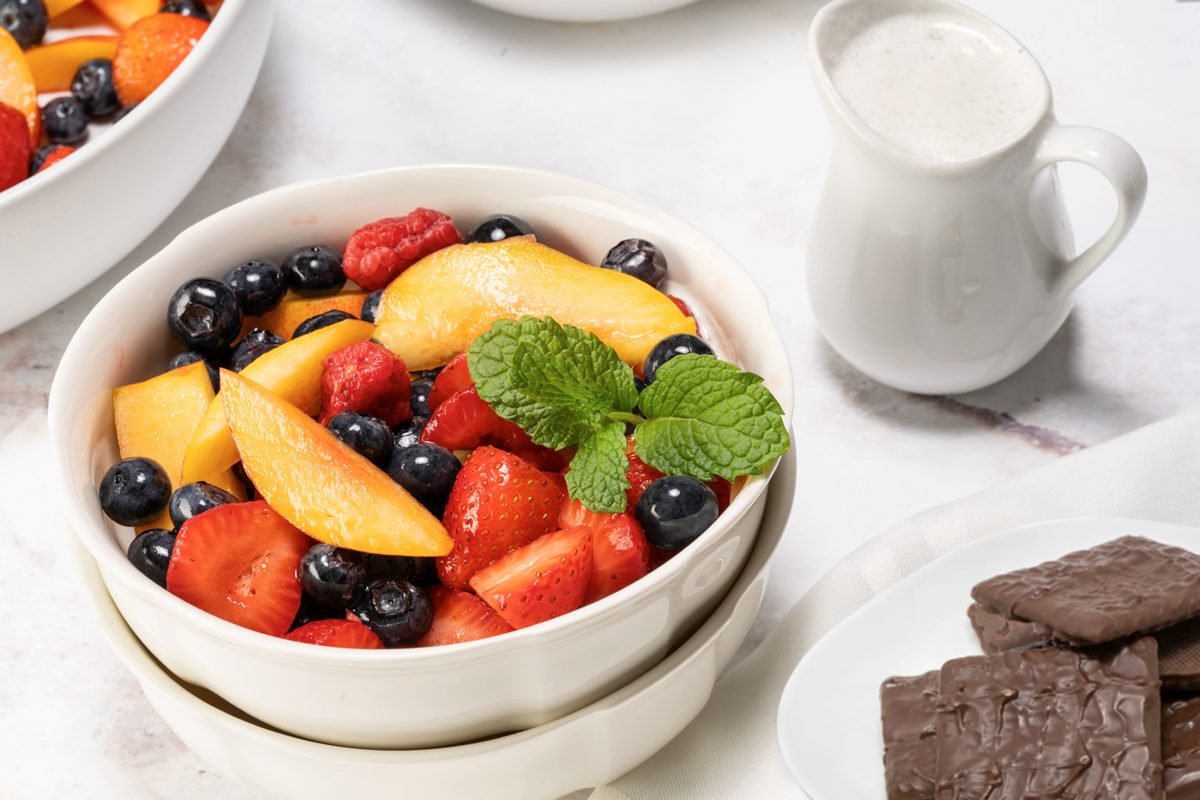 Fruit Dessert is served with yogurt dip and chocolate Graham Crackers