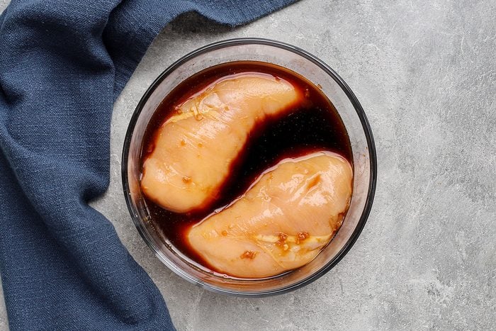 Marinating the chicken for grilled teriyaki chicken.