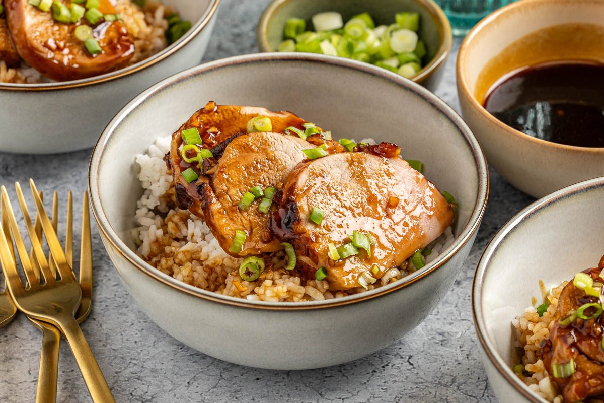 Taste of Home Hoisin Pork Tenderloin photo of the finished recipe served on plates. 
