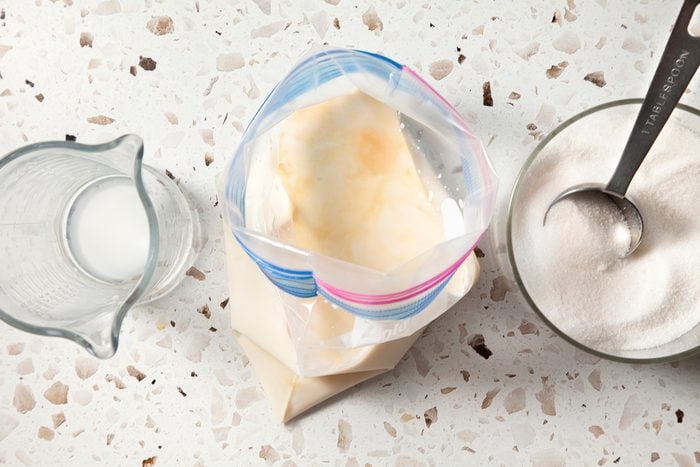 In a small resealable plastic bag, combine the milk, sugar, evaporated milk and vanilla.