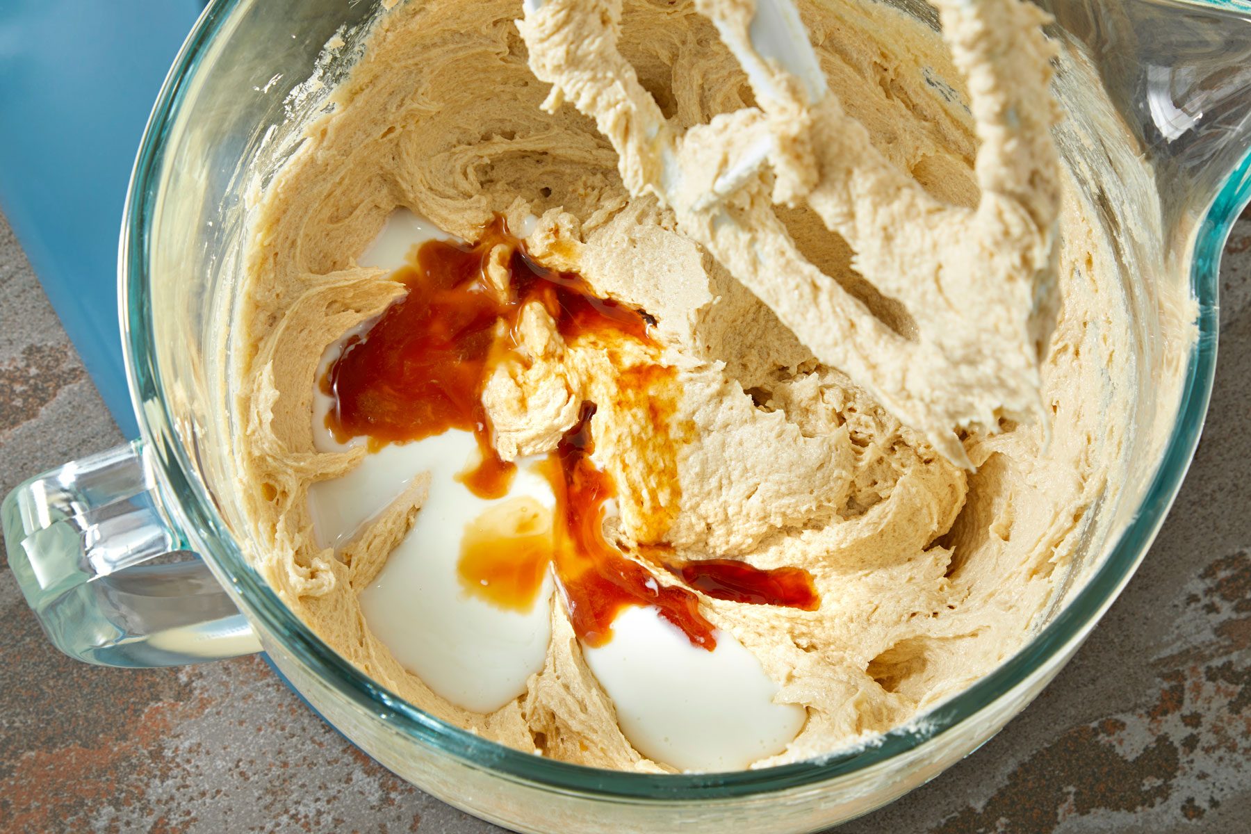 Buttermilk and vanilla added to the butter, eggs and sugar mixture.