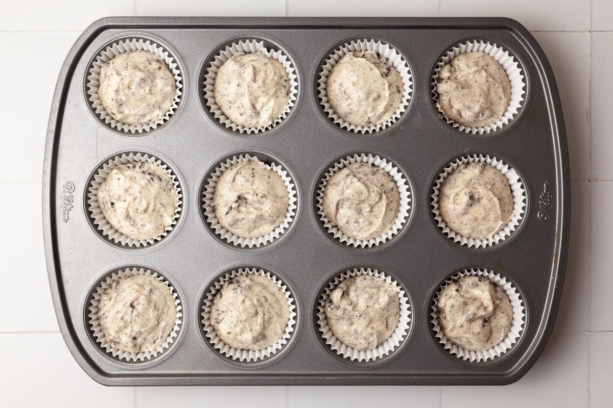 Step 3 of Taste of Home Oreo Cupcakes is to fill the prepared cups 3/4 full, and bake the cupcakes for 20 to 22 minutes, or until a toothpick inserted in the center of one comes out clean. Let the cupcakes cool in the pans for 10 minutes before removing them to the wire racks to cool completely.
