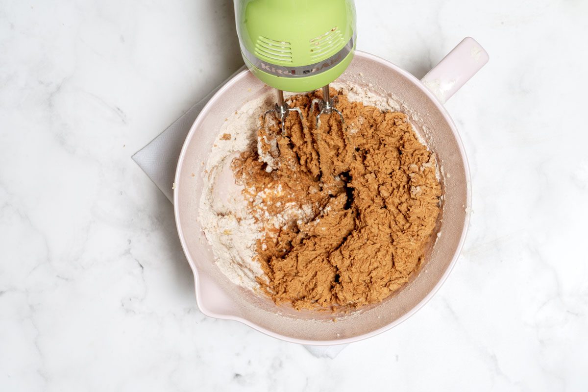 mixing dough for heart shaped cookies