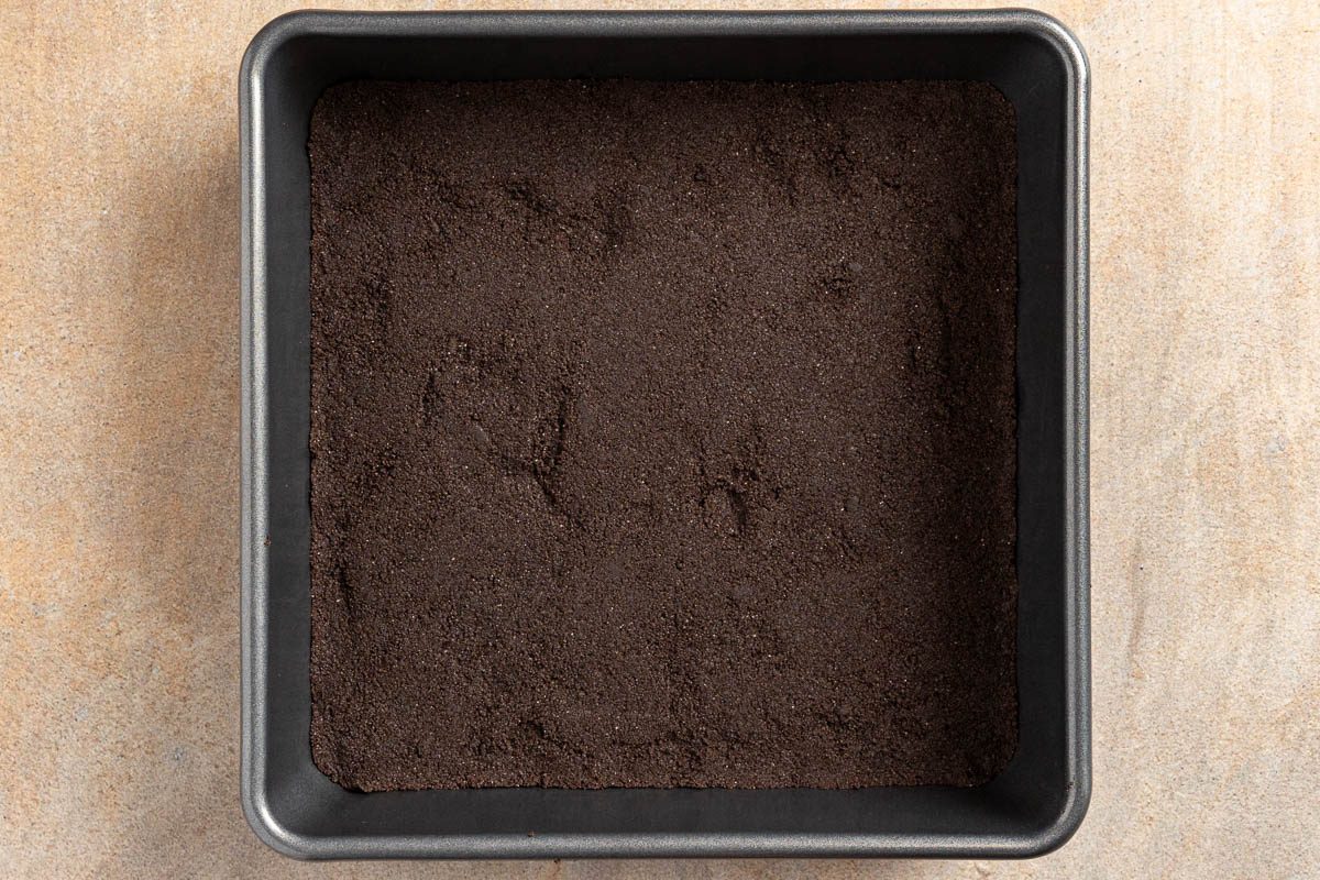 Taste of Home Peanut Butter Lasagna recipe photo of the cookied crust in a 9 inch baking pan.