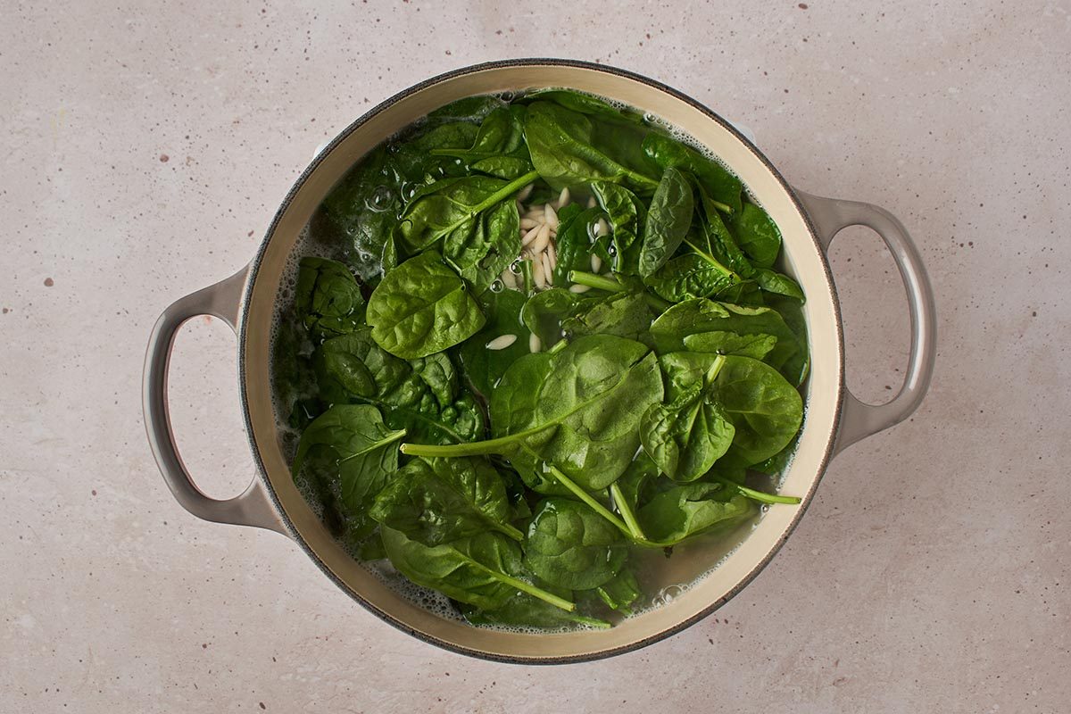 Cook orzo and add spinach
