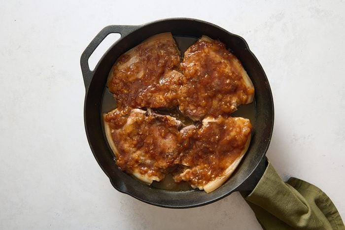 Pork chops after being baked in the oven