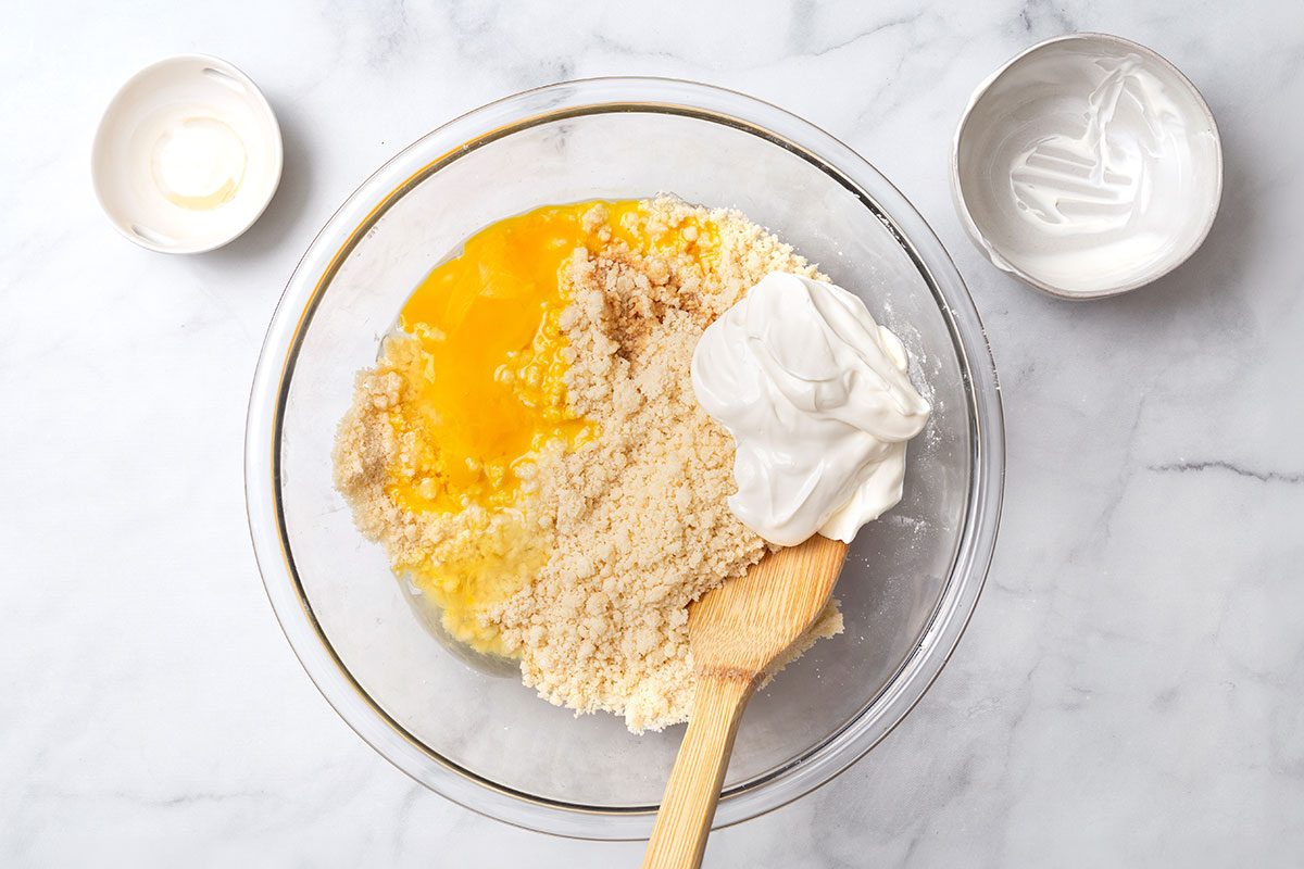 Batter mixture with sour cream, vanilla and eggs for step 2 of Raspberry Coffee Cake recipe for Taste of Home