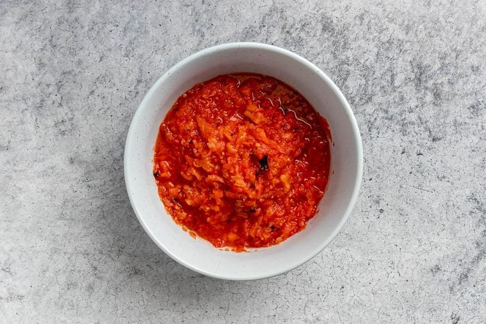 Taste of Home Roasted Salsa Recipe photo of all the tomatoes processed and in a large bowl.