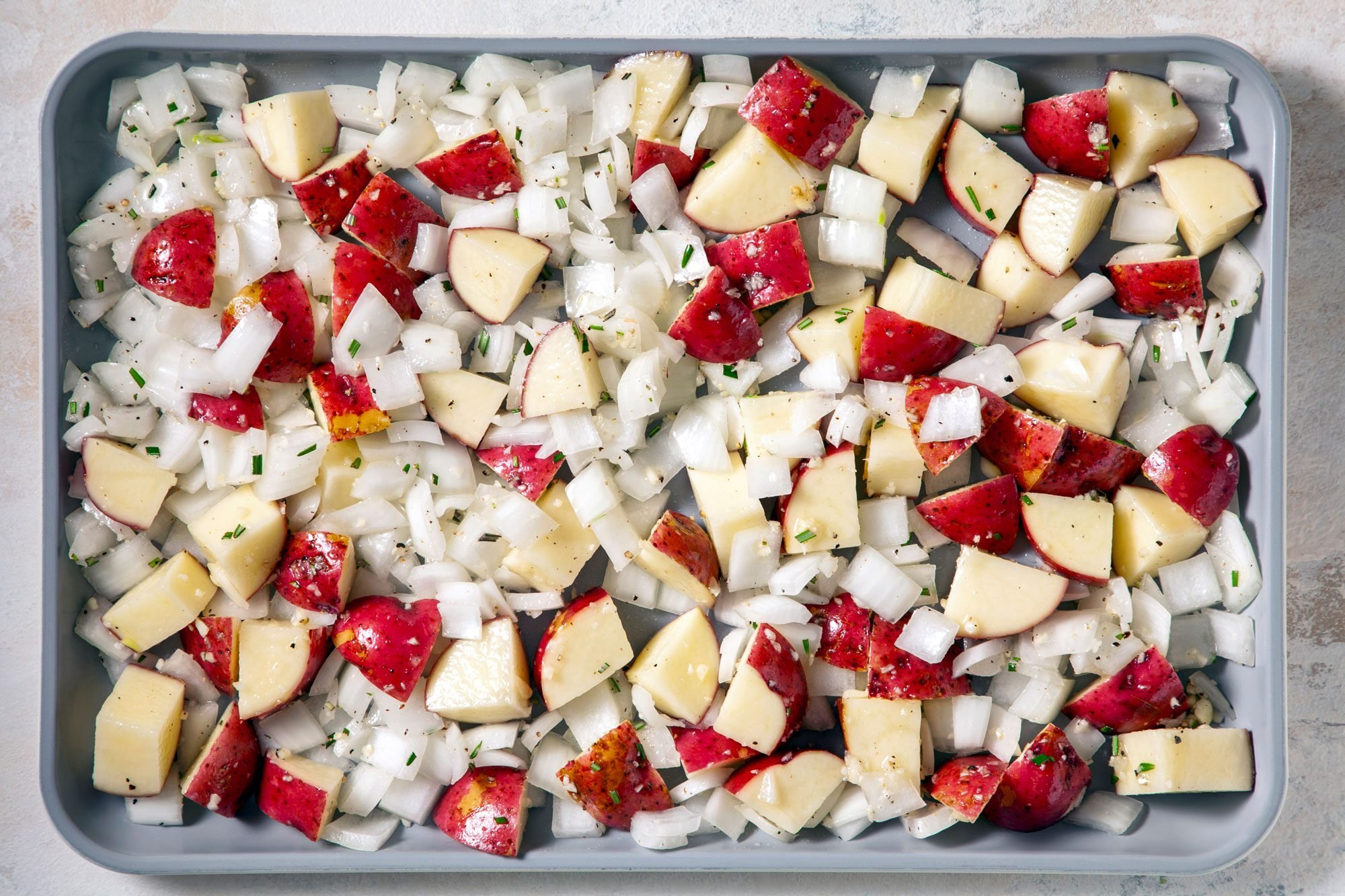 Transfer to a baking pan coated with cooking spray