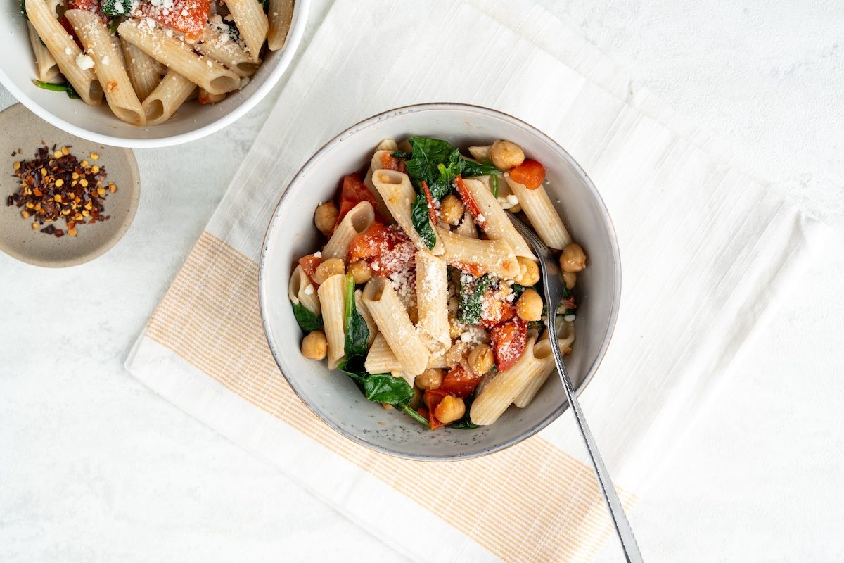 Overhead landscape shot of Taste of Home's Spinach Tomato Pasta.
