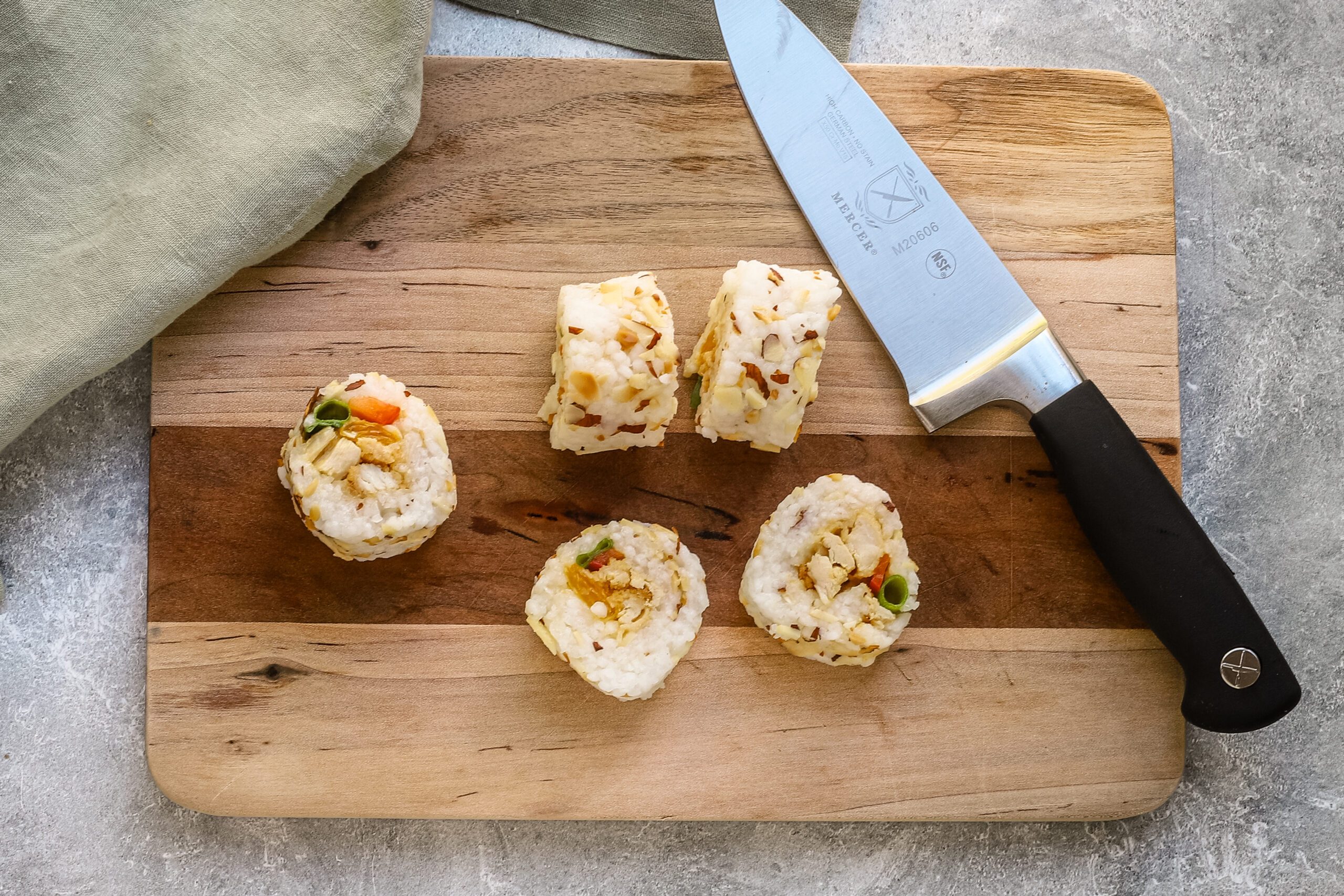 Slicing the chicken tempura roll.