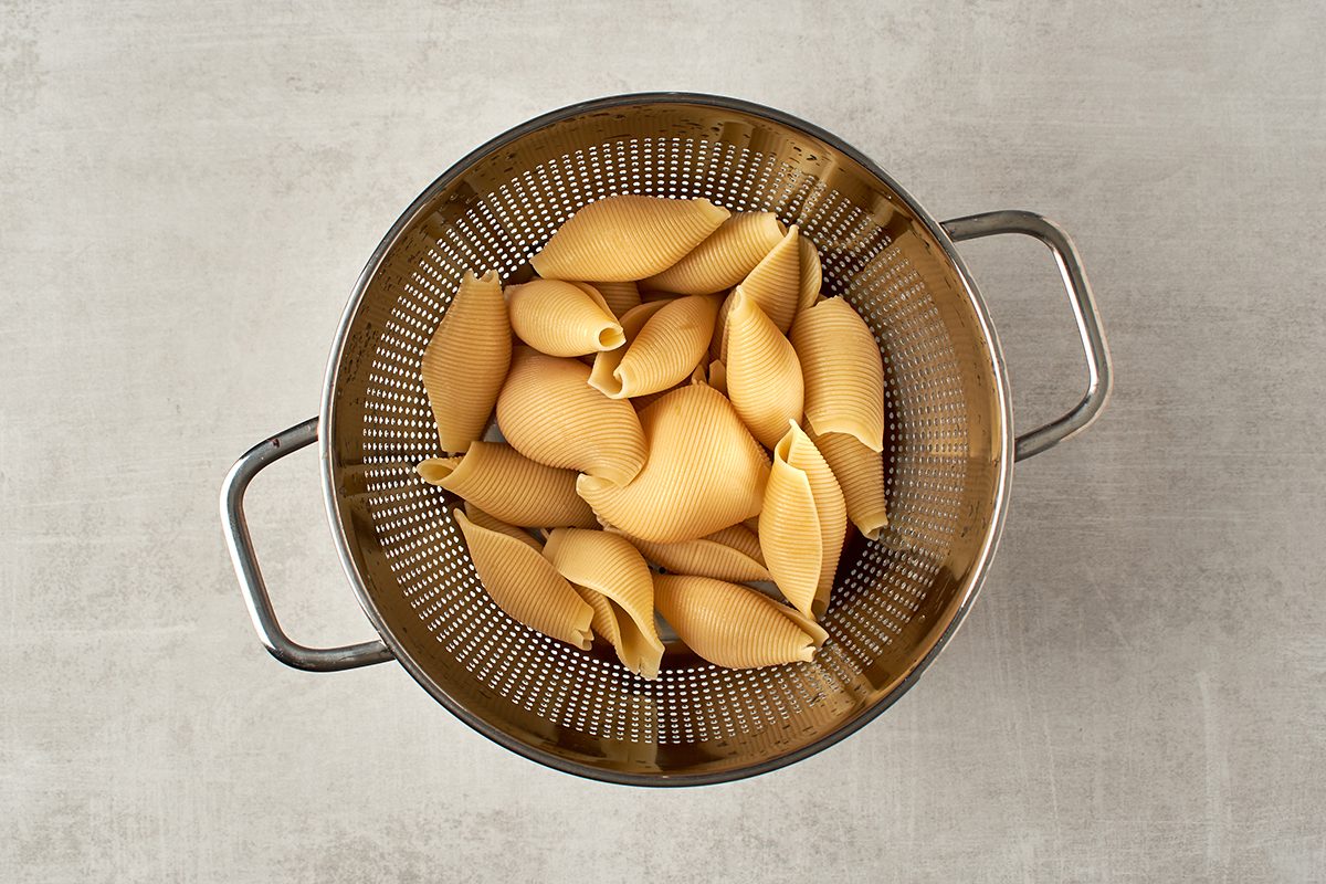 Cook pasta shells