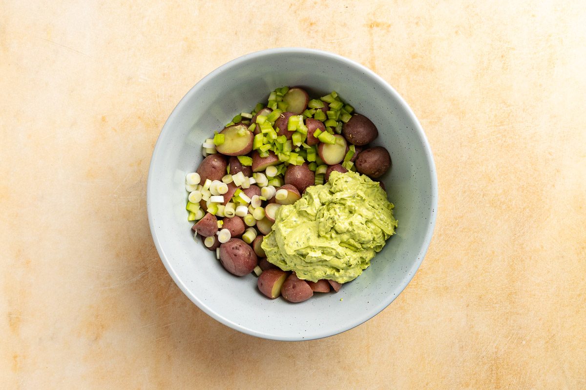 Taste of Home Vegan Potato Salad recipe photo of the prepared dressing in the mixing bowl with the potatoes.