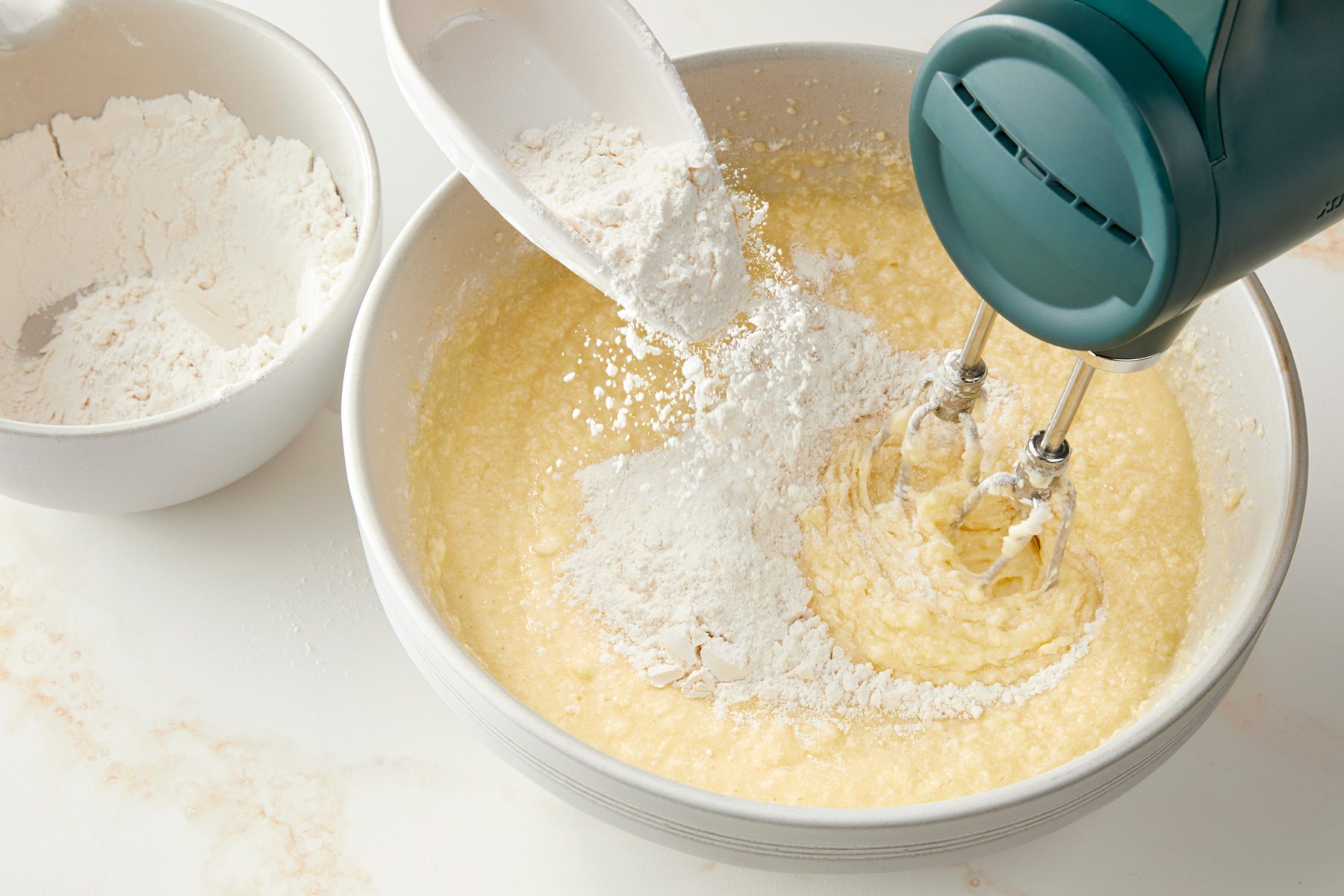 Add in flour to the mixture 