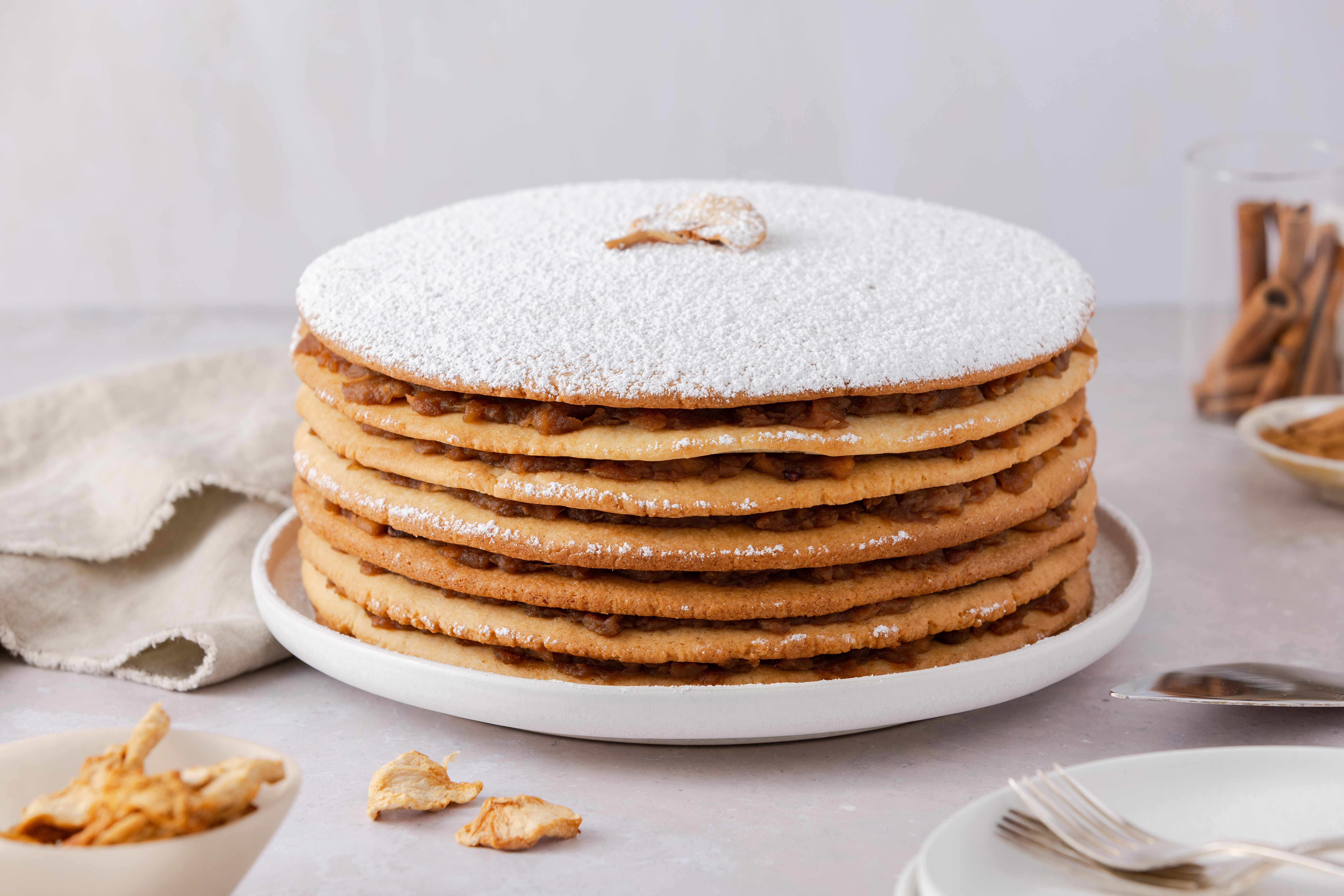 Apple stack cake ready on serving plate.