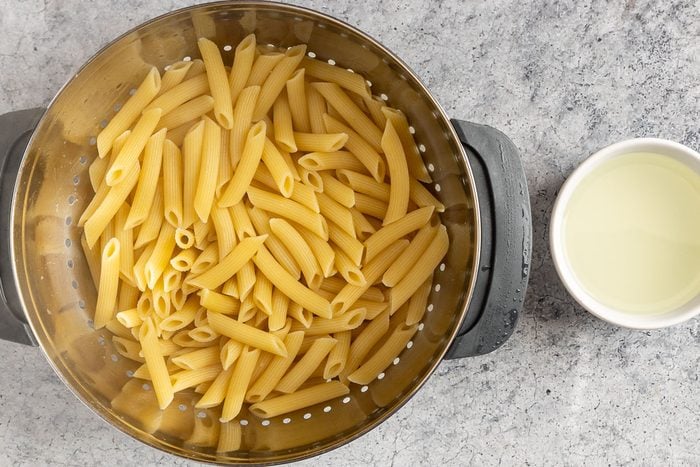 cooked pasta with reserved pasta water for the sauce.