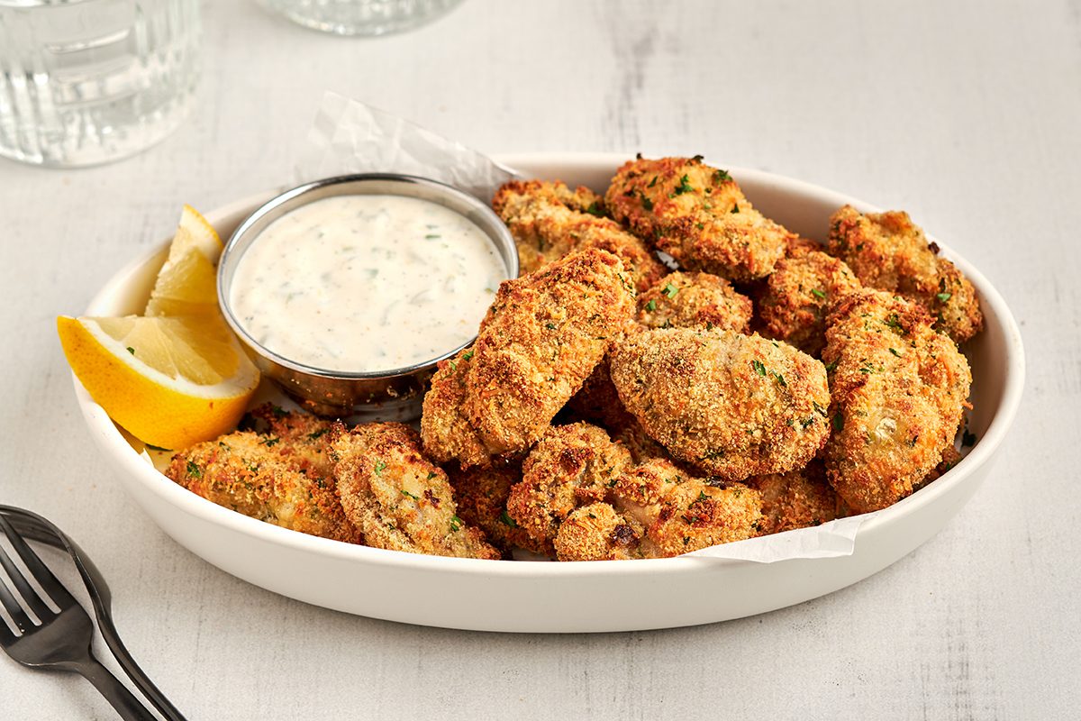 Try this award-winning recipe by Taste of Home for breaded and baked oysters with zesty jalapeño mayo.