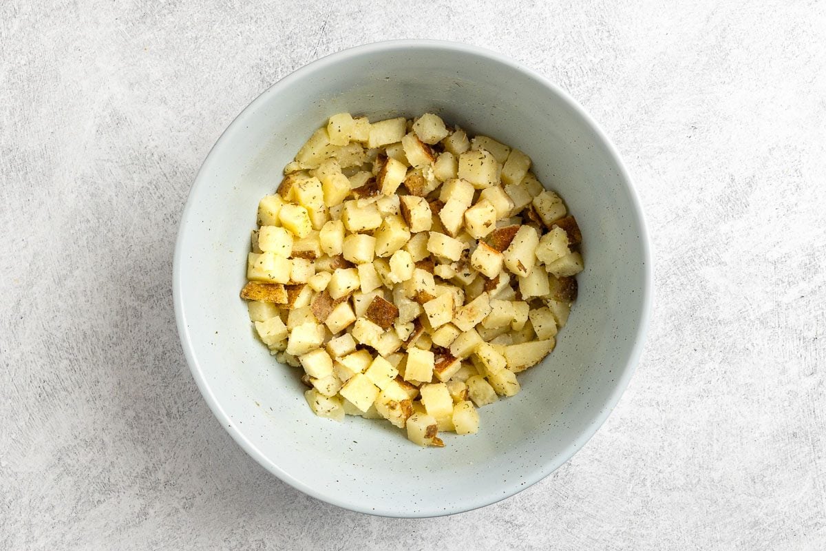 Taste of Home Baked Potato Pizza photo of preparing the potatoes.
