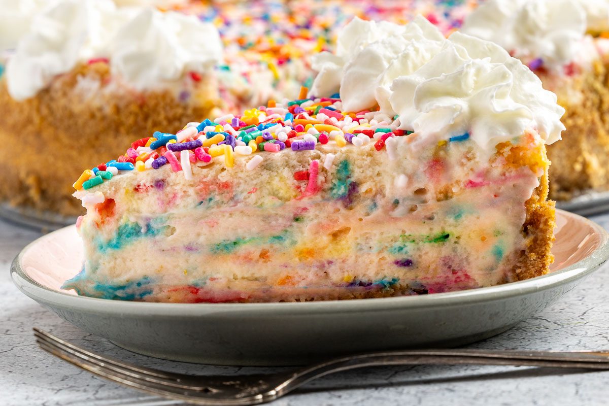 Taste of Home Birthday Cheesecake photo of the finished recipe cut into slices and served on plates.