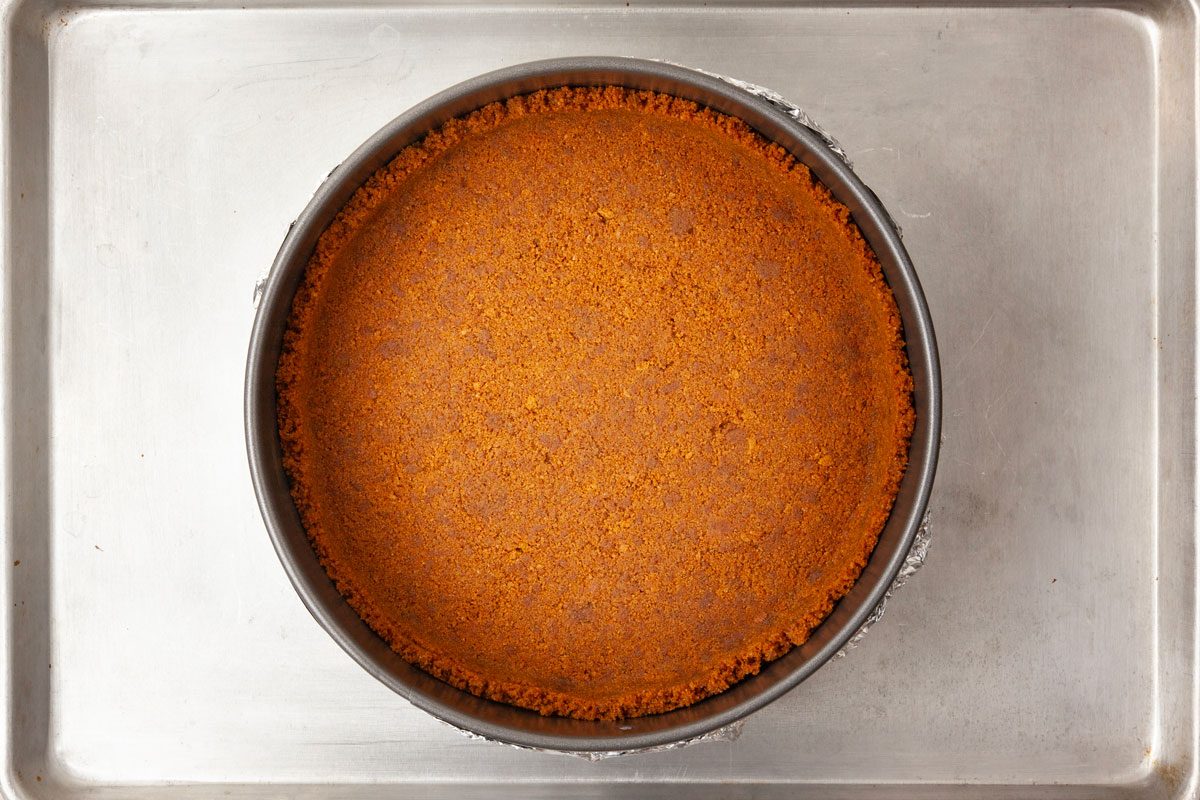 Step 1 of Taste of Home Biscoff Cheesecake is to prepare the crust