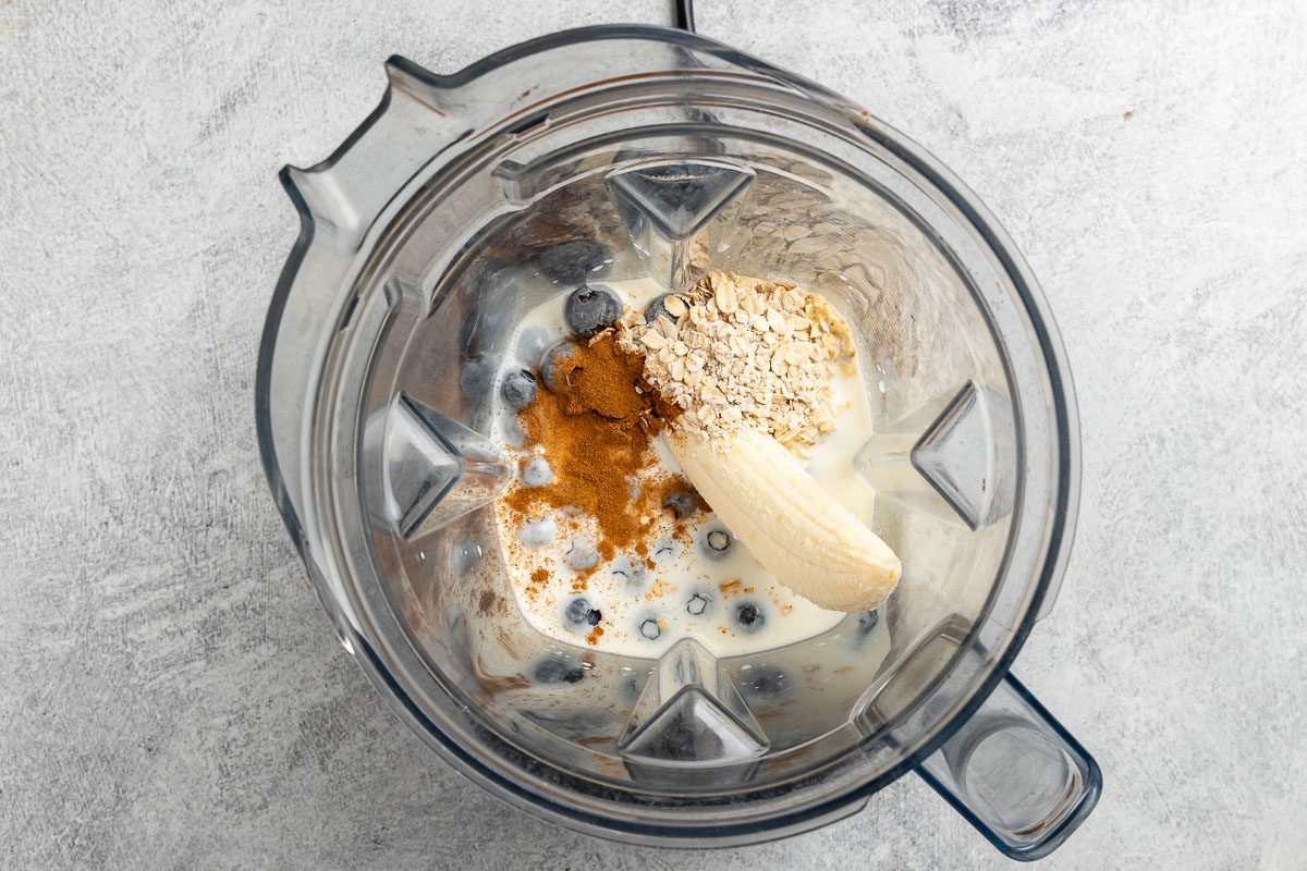 Blueberry Banana Smoothie ingredients in a blender