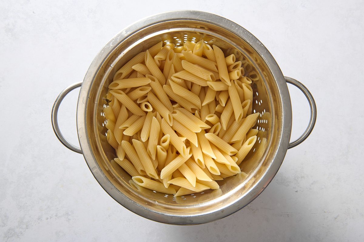 Pasta draining in a colander
