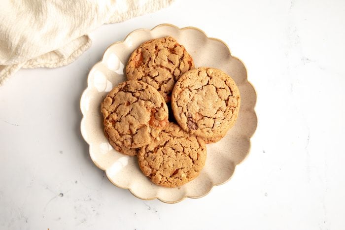 Close up beauty shot for Taste of Home Butterfinger Cookies being served on a plate.