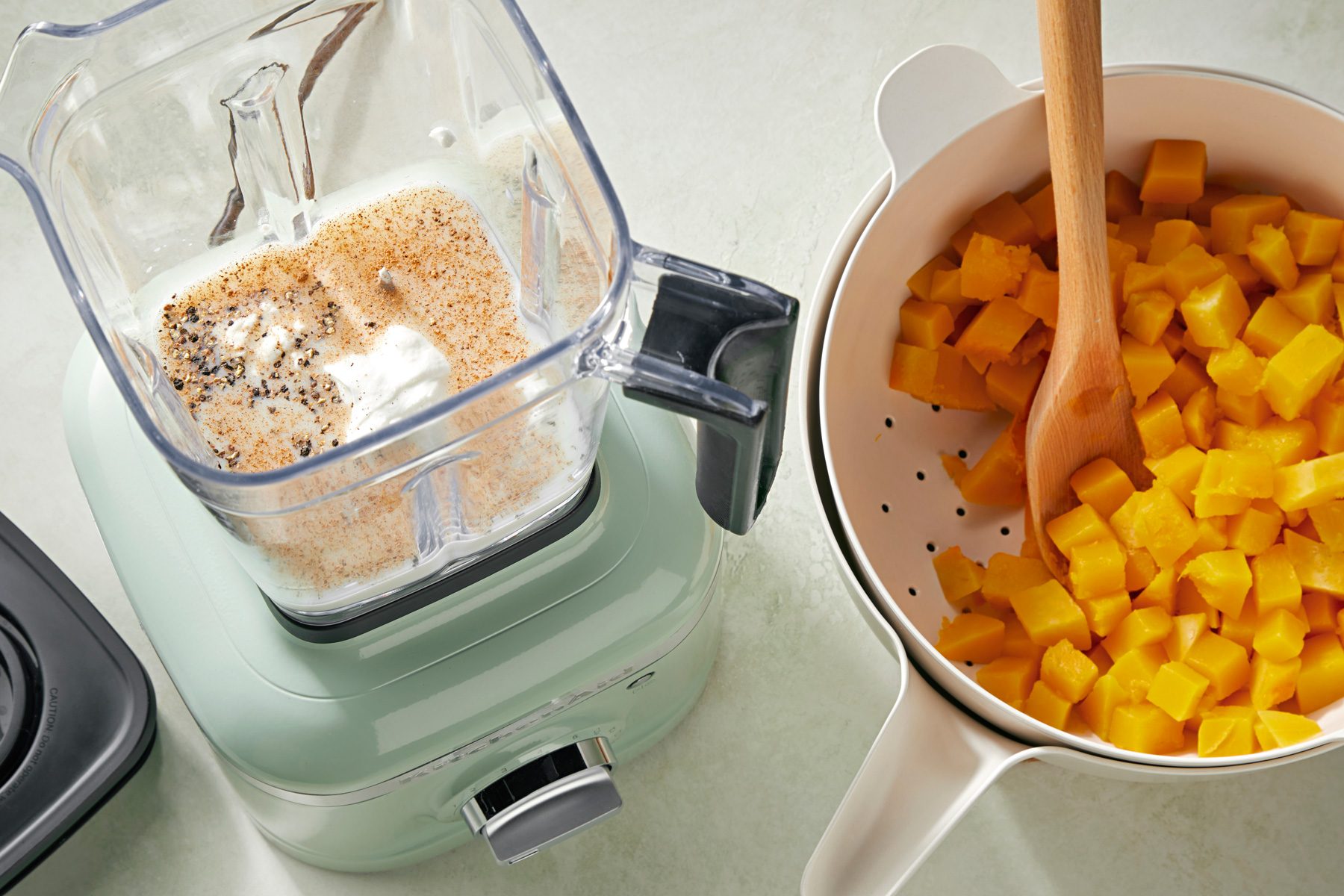 place yogurt; milk; salt; pepper and nutmeg in a blender; Drain squash and transfer to blender