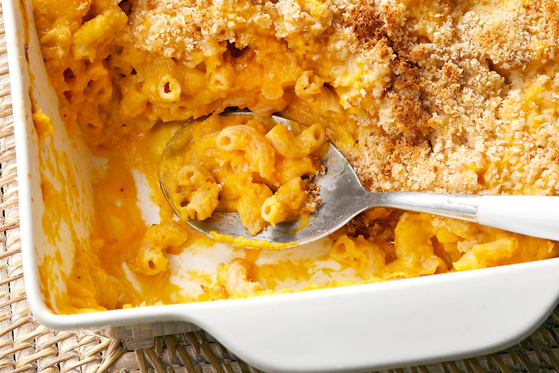 close shot of butternut squash mac and cheese in a baking dish