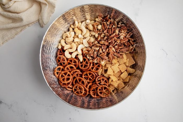 Overhead shot for Taste of Home Caramel Chex Mix with dry ingredients in bowl before being mixed.