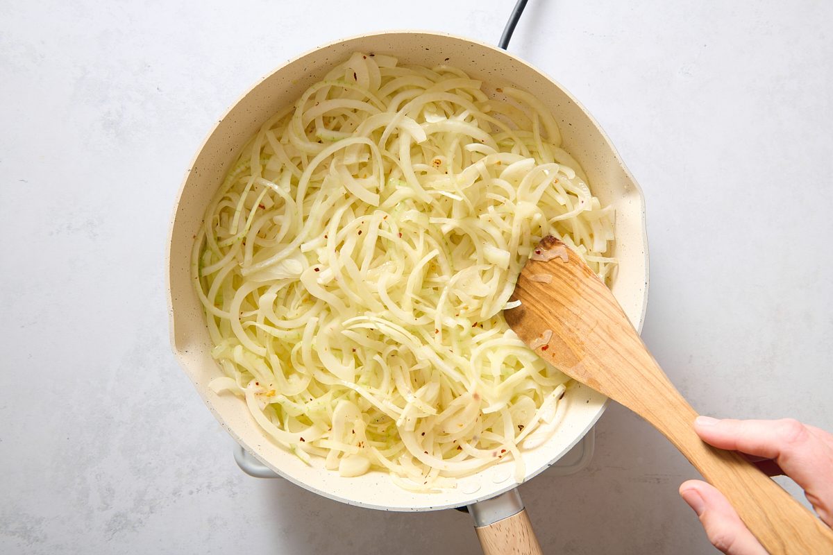 Sautéing the seasoned onions