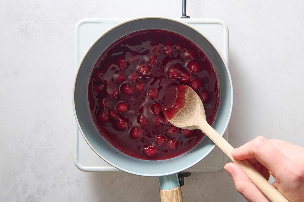 Cooking the cherry mixture in a saucepan