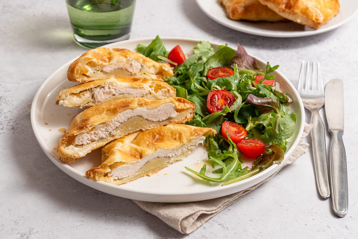 Plate With Pockets Of Chicken In Puff Pastry And Salad