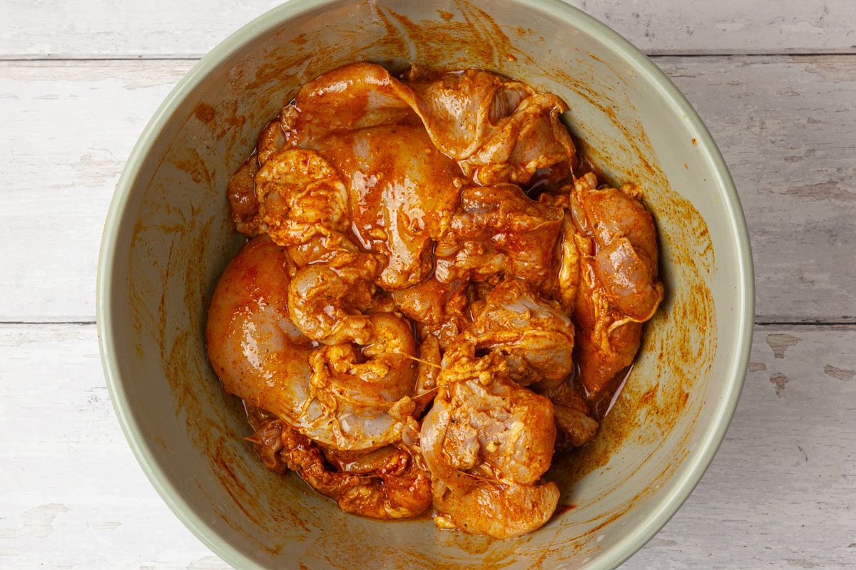 Step 1 of Taste of Home Chicken Shawarma is to marinate the chicken