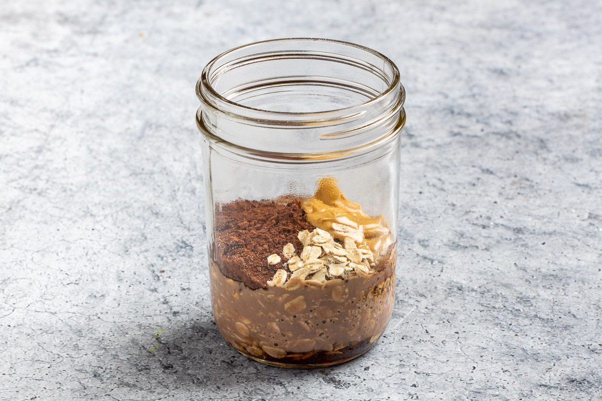 combining the ingredients in a mason jar.