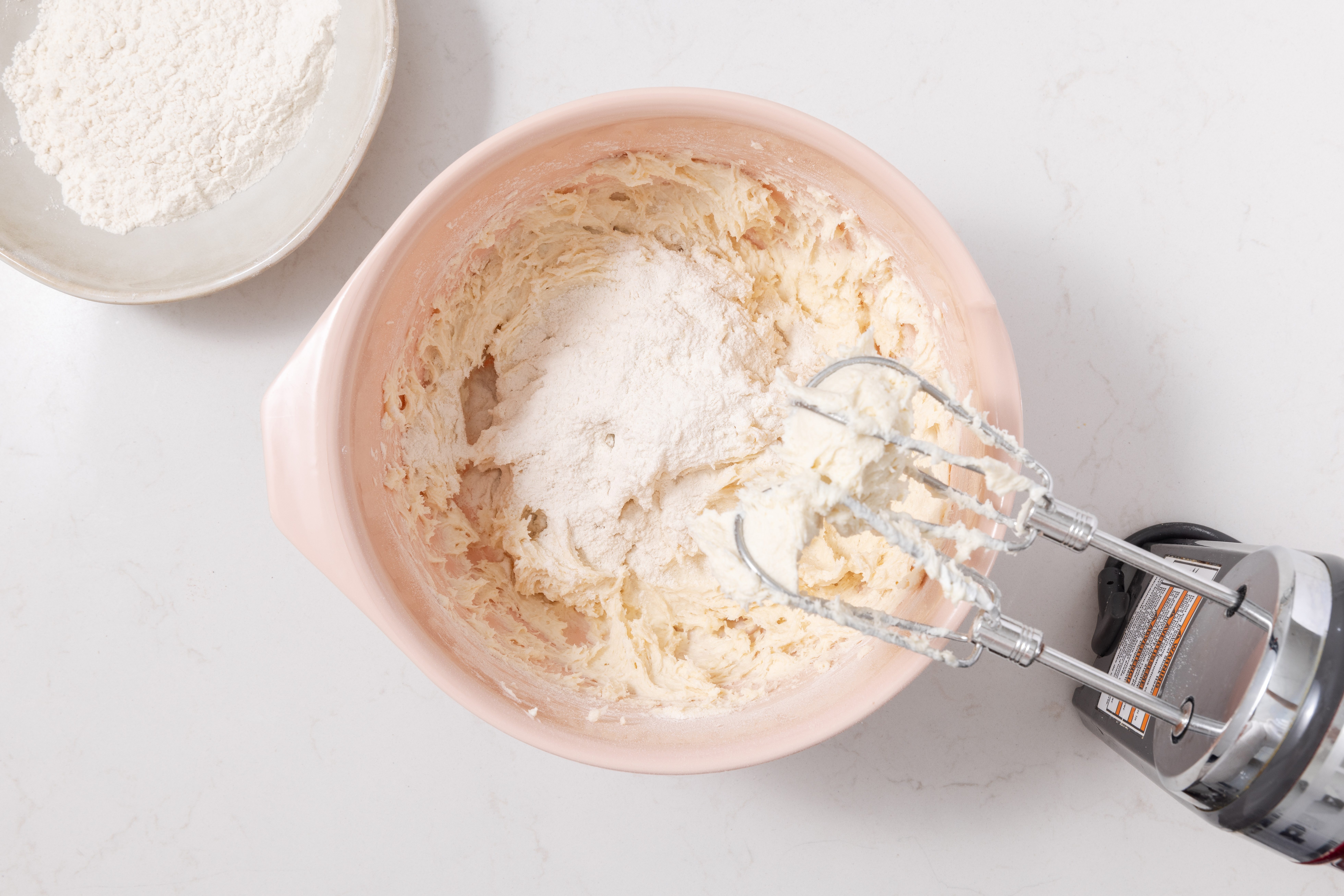 Dough for chocolate rugelach being mixed in mixing bowl.