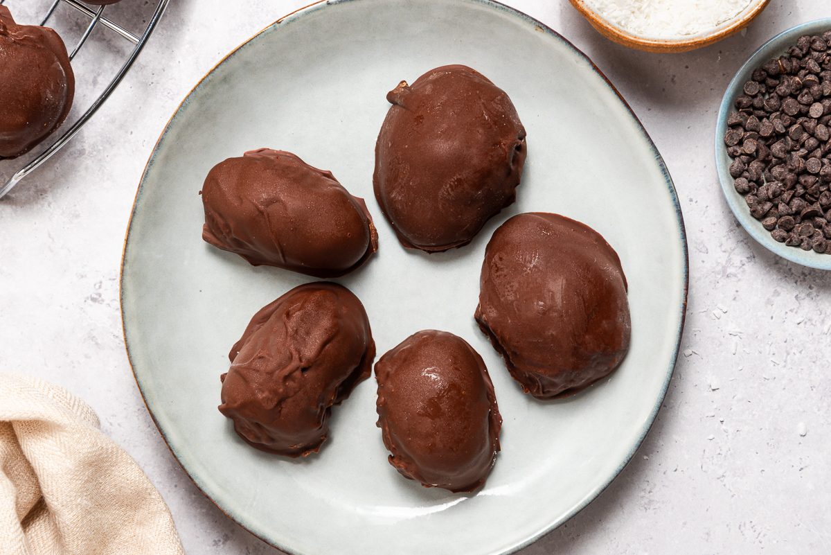 Frozen Cream Cheese Coconut Eggs Dipped In Melted Chocolate
